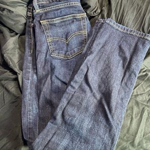 men 28inch levi blue jeans, straight cut.